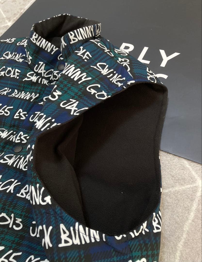 新品 パーリーゲイツ ジャックバニー リバーシブル中綿ベスト(4)サイズM/紺