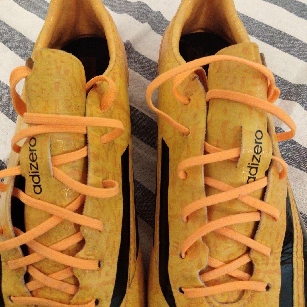 ディダス アディゼロ F50 HG-ジャパン LM(イエロー×オレンジ)