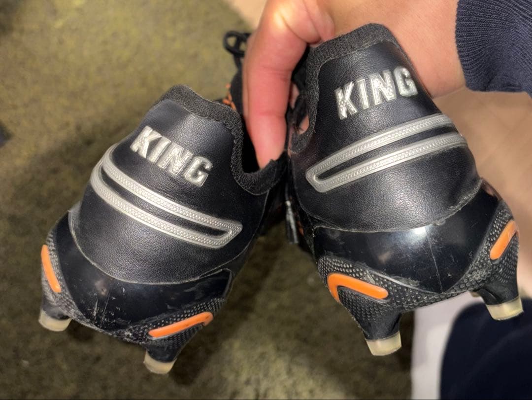 サッカーシューズ ブラック/オレンジ FG