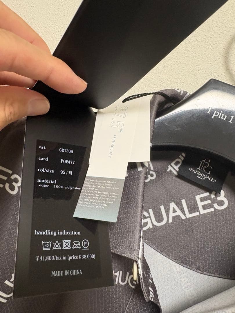 新品1PIU1UGUALE3 GOLF24SSランダムロゴ総柄ポロシャツ灰Ⅵ