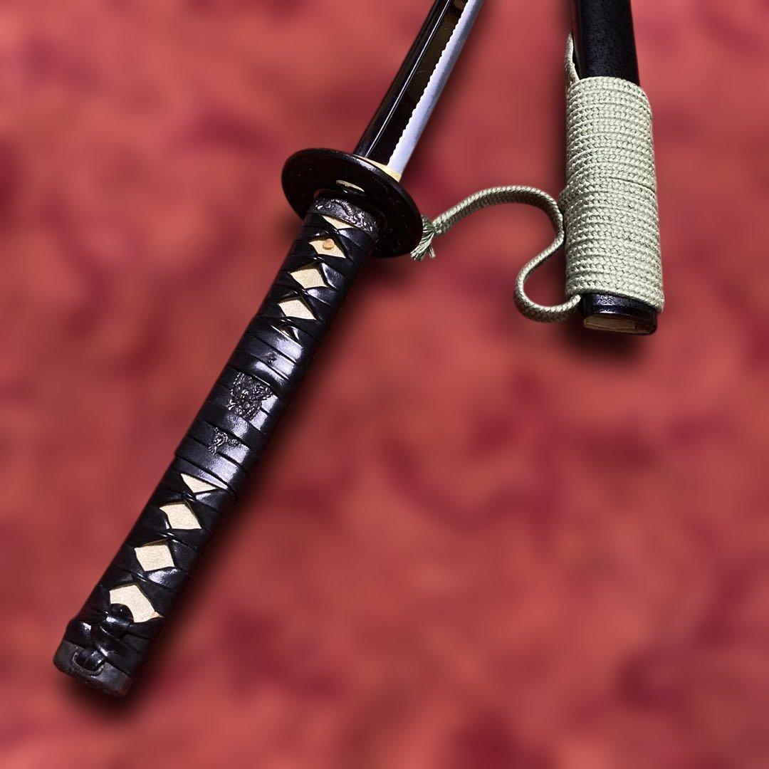 豪華居合刀 黒革巻柄 鶴松図楕円鍔 黒梨地鞘