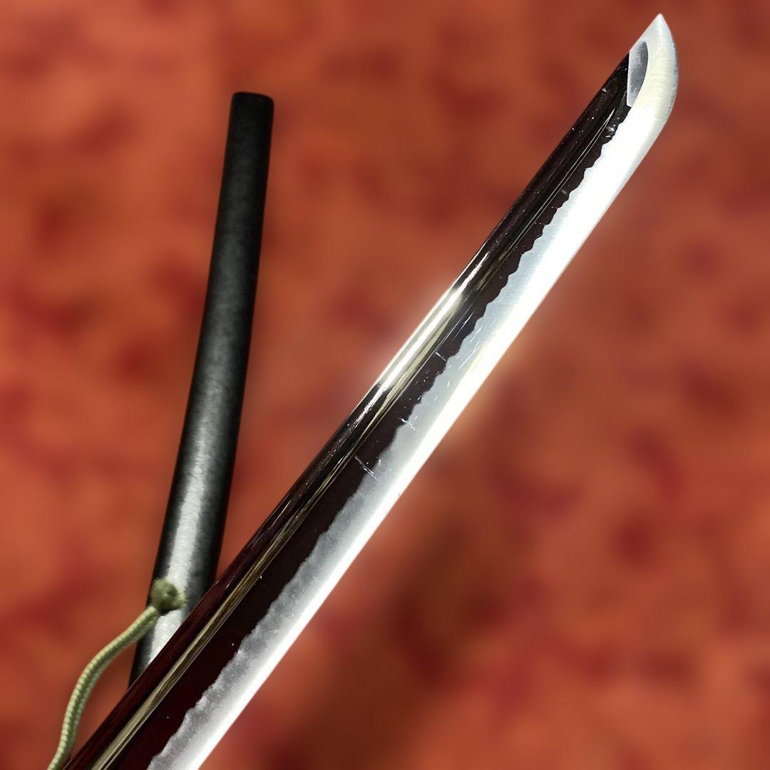 豪華居合刀 黒革巻柄 鶴松図楕円鍔 黒梨地鞘