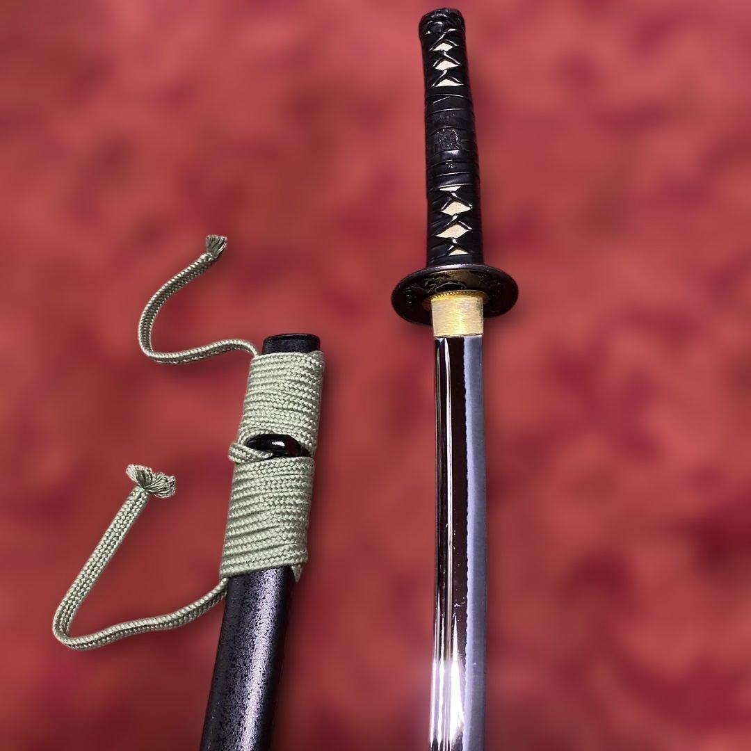 豪華居合刀 黒革巻柄 鶴松図楕円鍔 黒梨地鞘