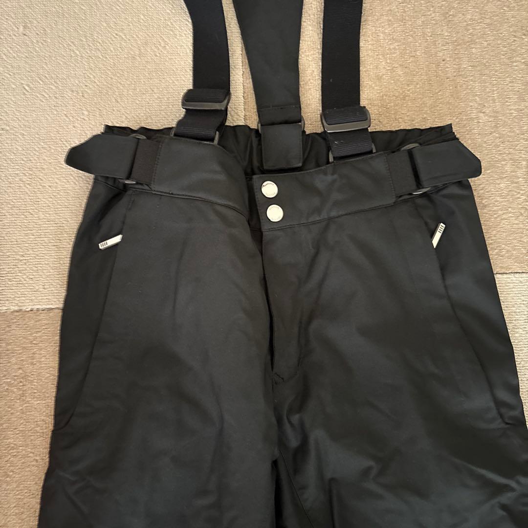 デサント赤いジャケットと黒いパンツのセット