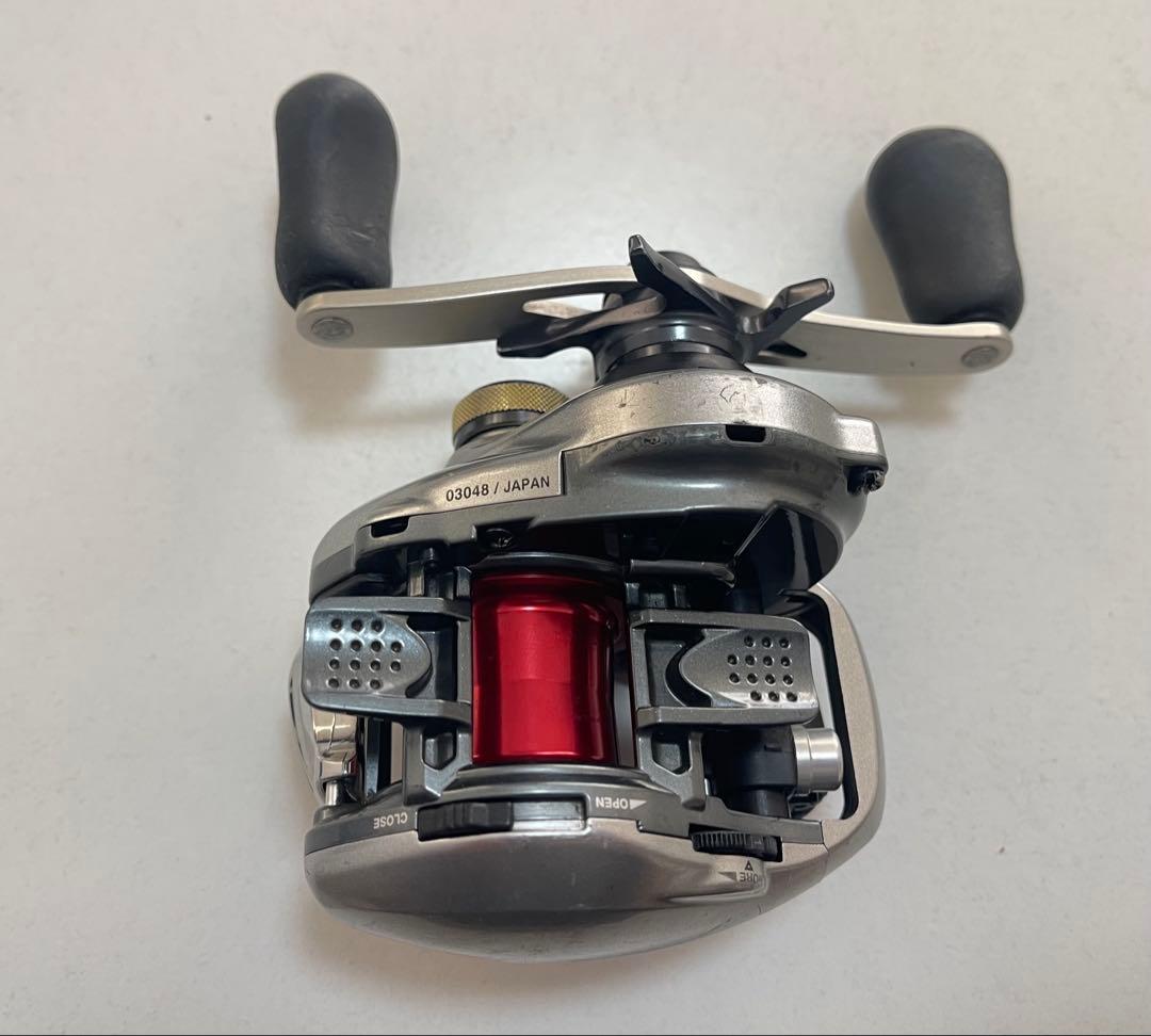 13 メタニウム XG 右ハンドル ZPI NRCスプール 他カスタム品 中古