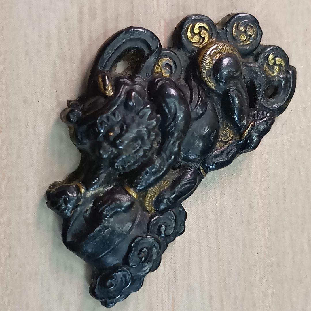 煙草入れ／雷神前金具／在銘あり