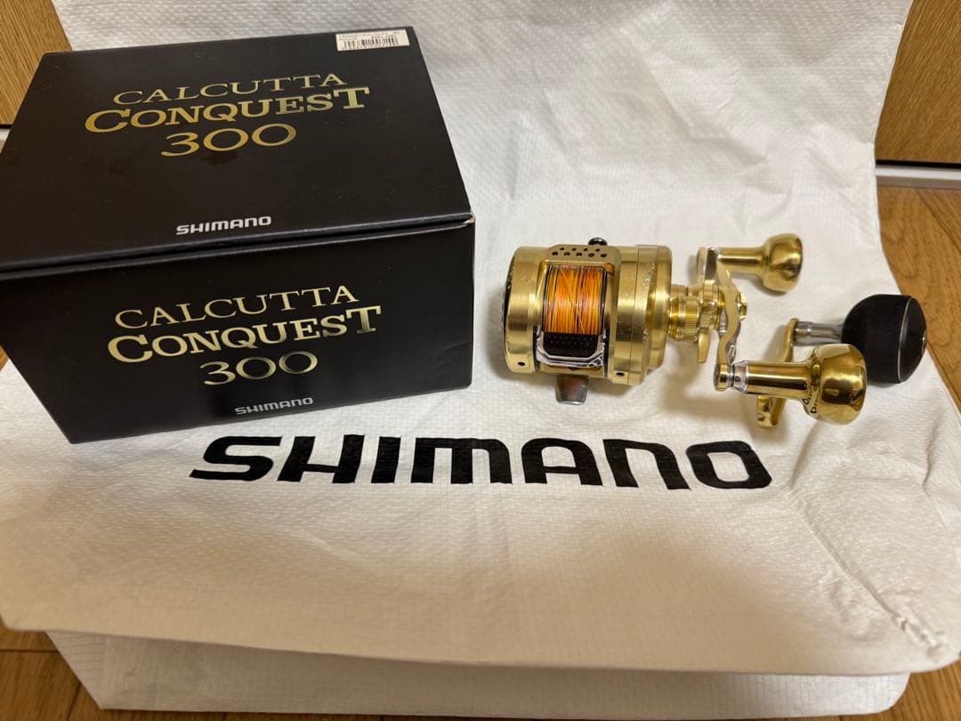 シマノ 15カルカッタコンクエスト300 社外ハンドル（純正有り）