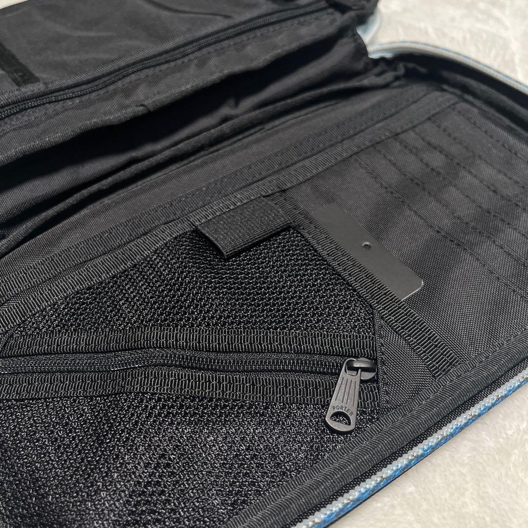 original fake PORTER パスポートケース 黒 青 KAWS