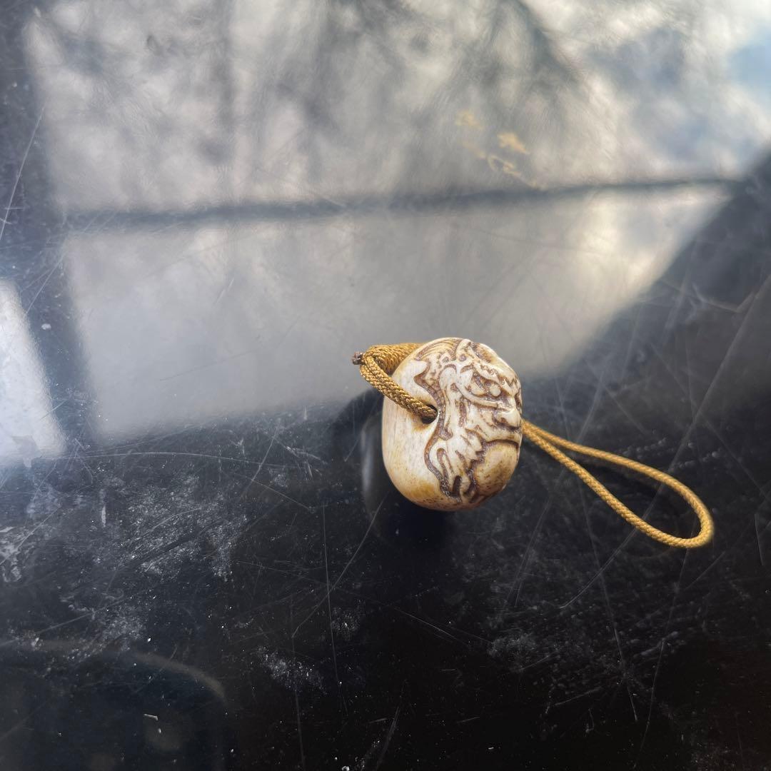 提げ物　緒締　玉龍　鹿角？