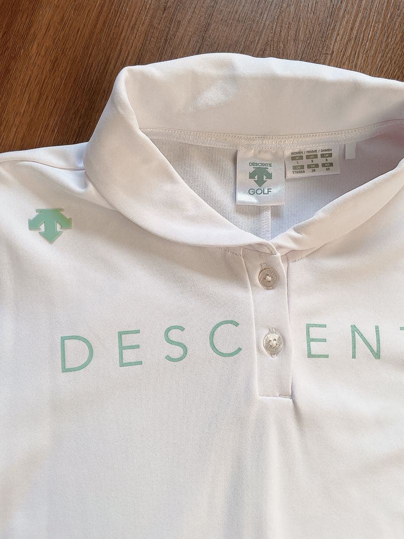 デサントゴルフセットアップトップススカート/M L