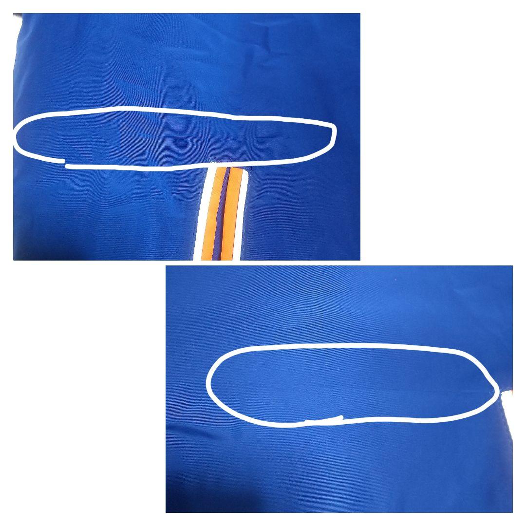 MLB メッツの刺繍ビッグロゴが映えるリバーシブル仕様の合皮スタジャン古着 XL