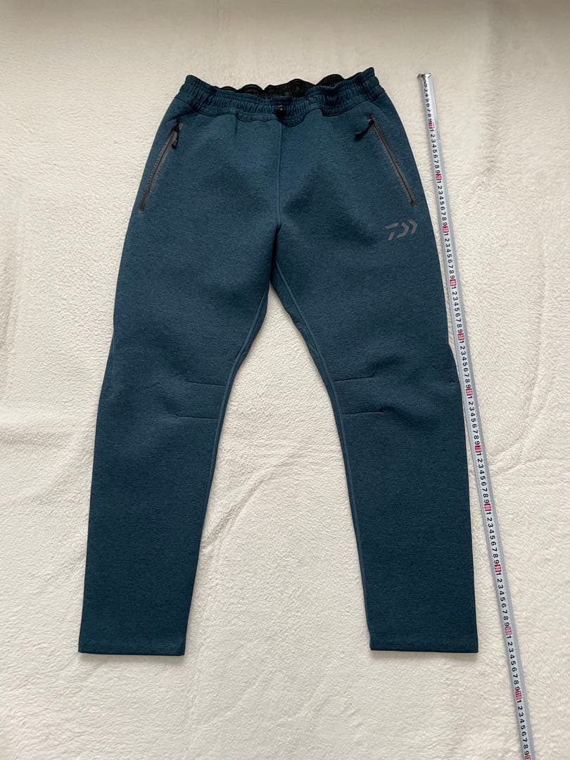 ダイワ　DAIWA ウィンドブロックジョガーパンツ　XLサイズ　フェザーブルー