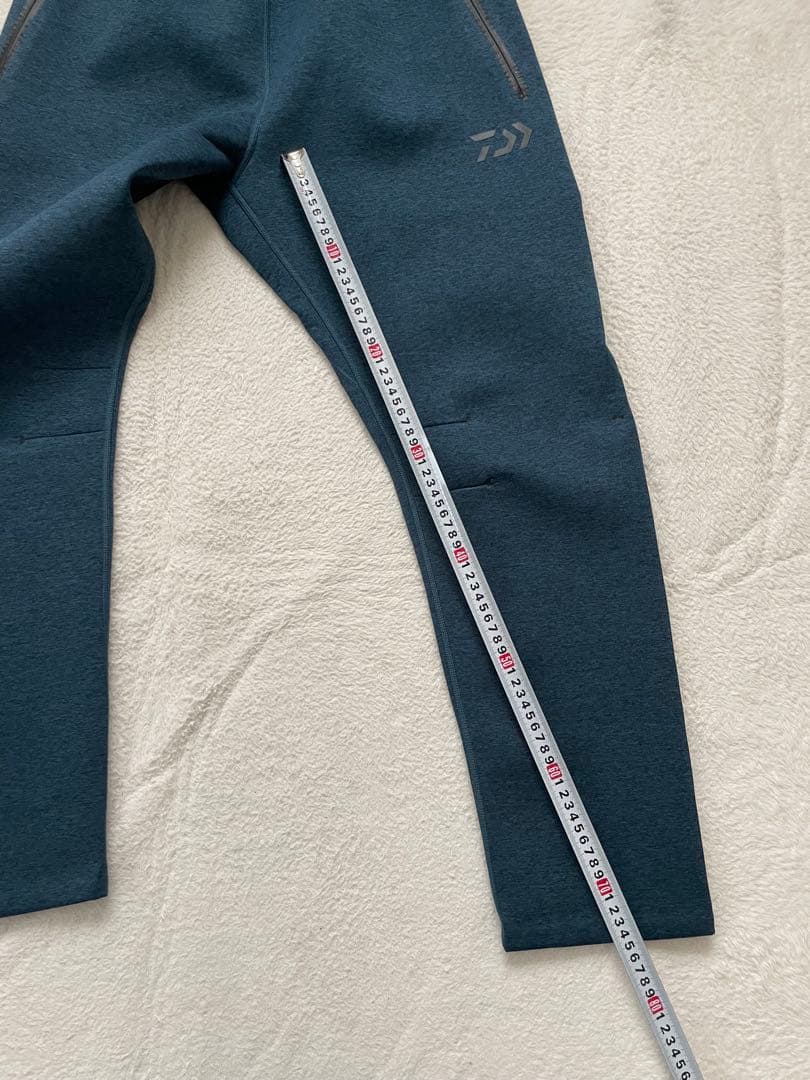 ダイワ　DAIWA ウィンドブロックジョガーパンツ　XLサイズ　フェザーブルー