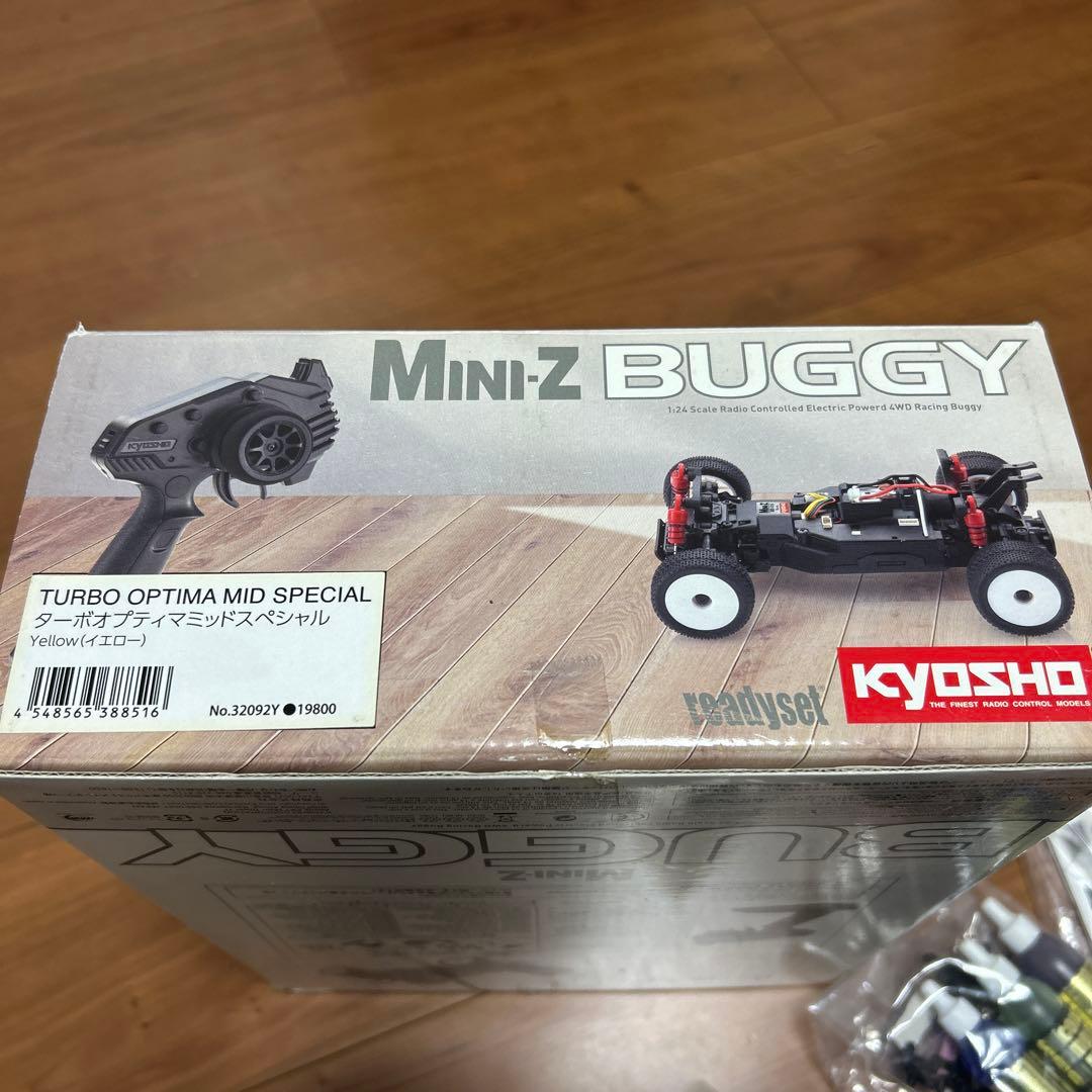 タカクワツトム