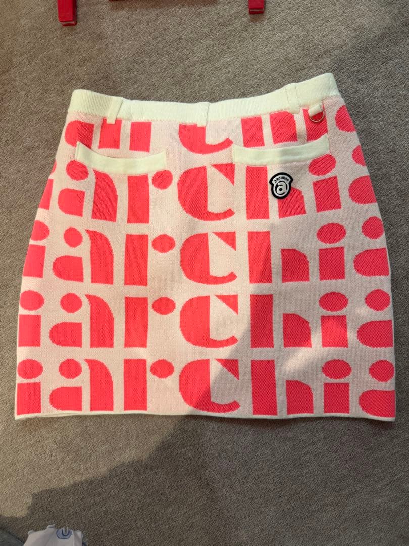アルチビオ ピンクとホワイトのゴルフスカート38