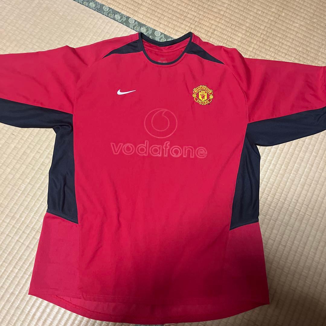 サッカーウェア二枚まとめ売りマンチェスターU Lサイズ　レアル・マドリード2XO