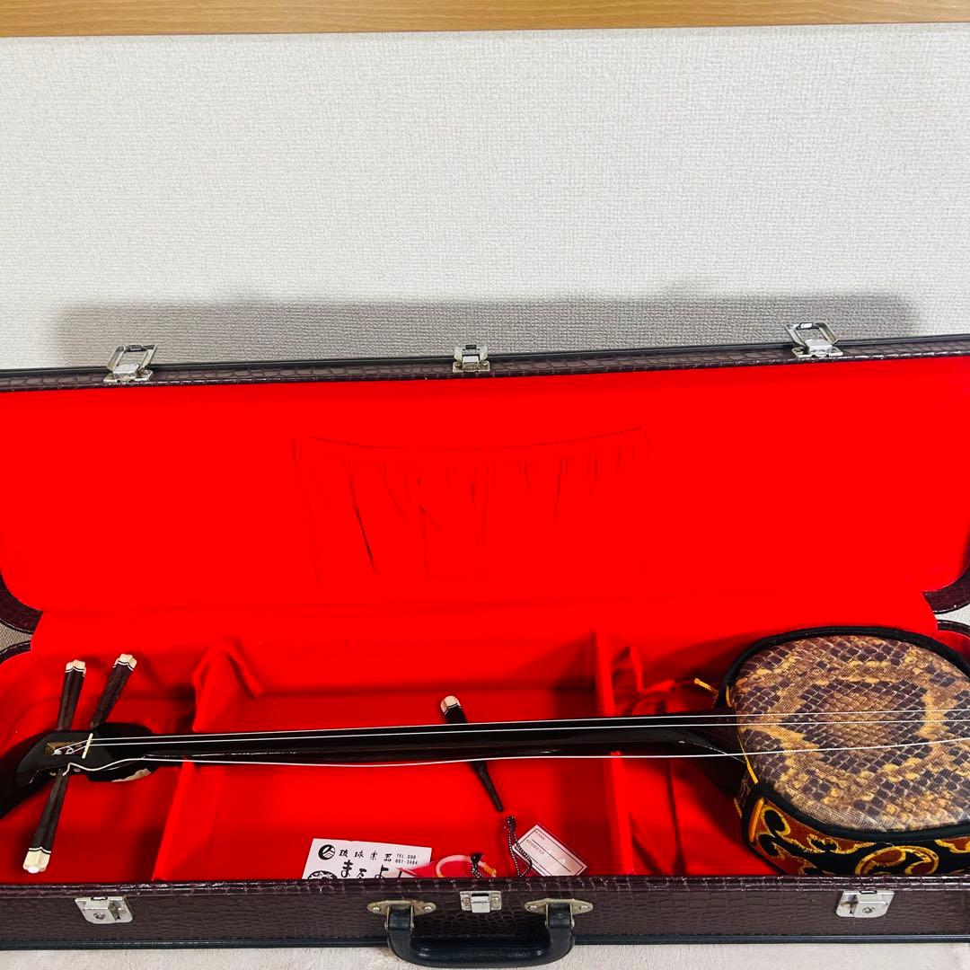 沖縄三線 三味線 人工革 合皮 ヘビ柄　ハードケース付 またよし　弦楽器