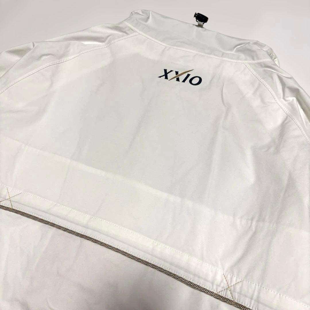 タグ付き未使用　xxio ゴルフ用レインウェア ホワイト ロゴ入　サイズXL