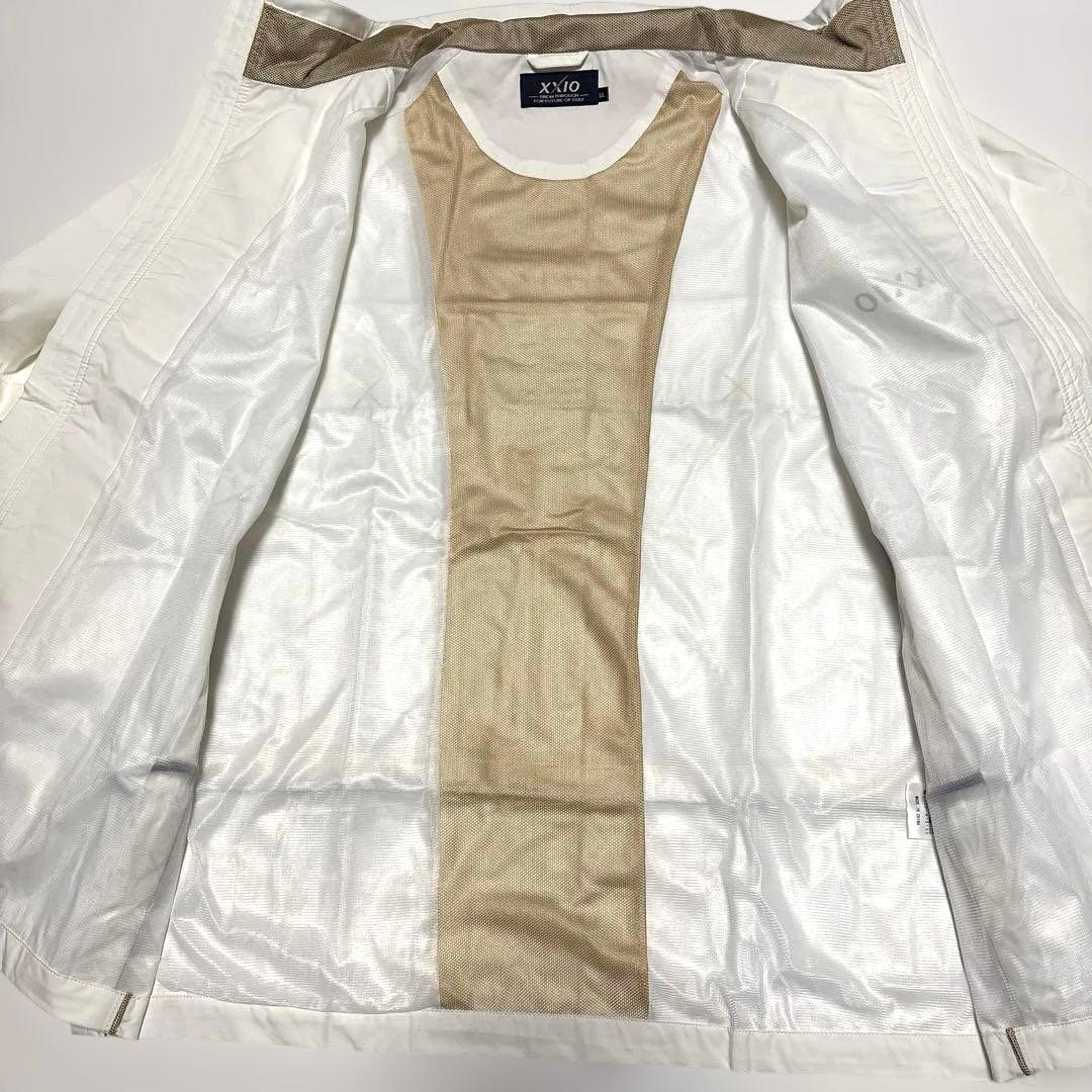 タグ付き未使用　xxio ゴルフ用レインウェア ホワイト ロゴ入　サイズXL