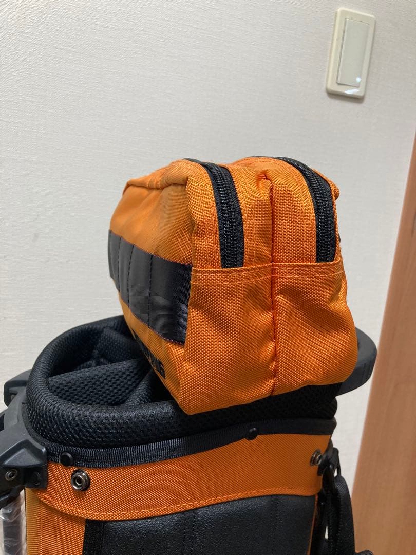 希少セット　BRIEFING キャディバッグ オレンジ　ラウンドポーチセット