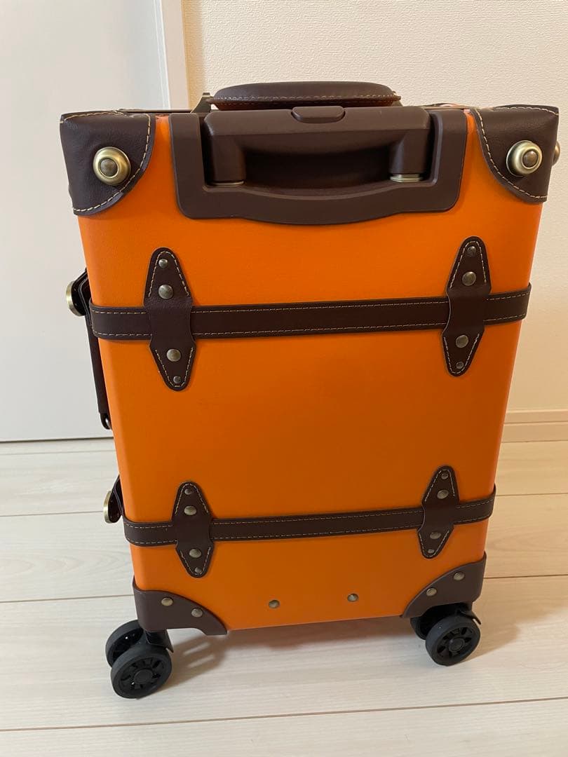 キャリーケース　トランク　スーツケース　オレンジ　旅行　おしゃれ　可愛い　高級