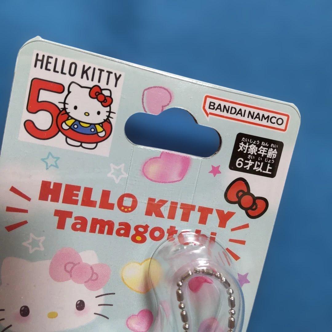 ハローキティたまごっち　50周年コラボ　BANDAI　レッド&スカイブルーセット