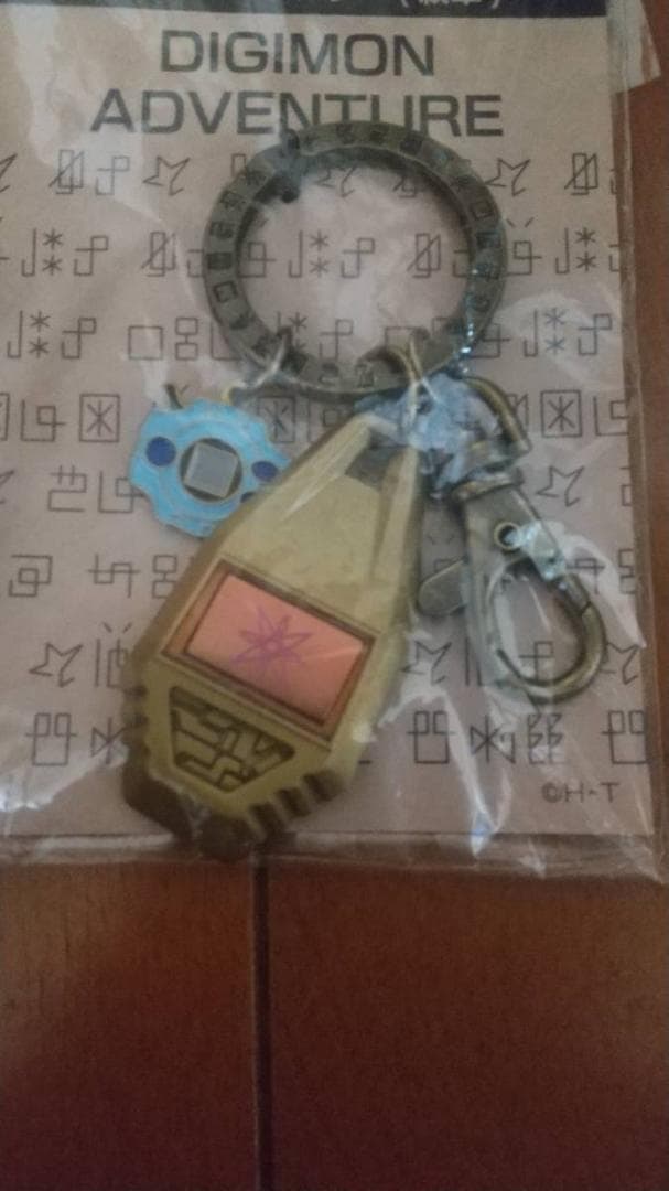 デジモンアドベンチャー 初期版 メタルキーホルダー 光の紋章 ヒカリ