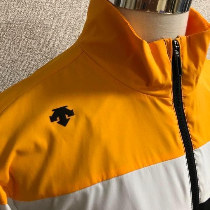 デサントゴルフ 三段切替 ウィンドジャケット イエローオレンジ XOサイズ