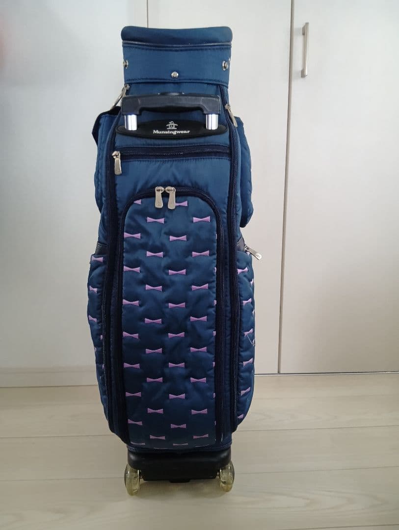 レディース中古収納式キャリーハンドル付きMunsingwearキャディバッグ