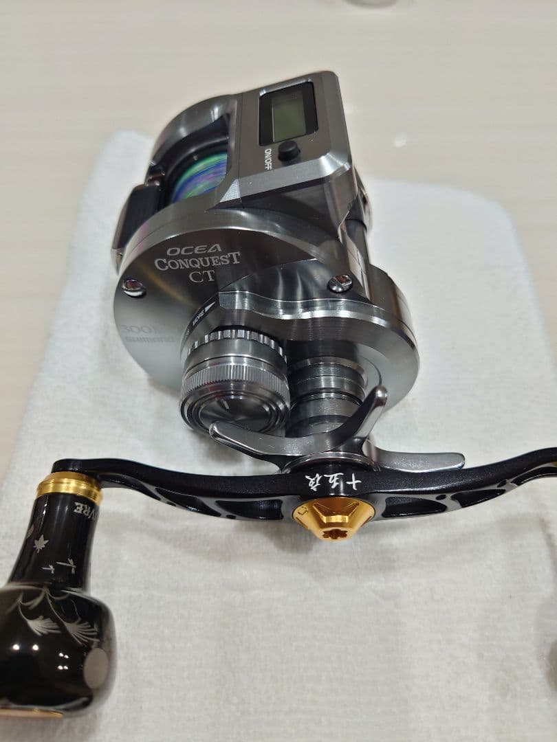 オシアコンクエストCT300HG×LIVRE CRANK110限定ハンドル付き