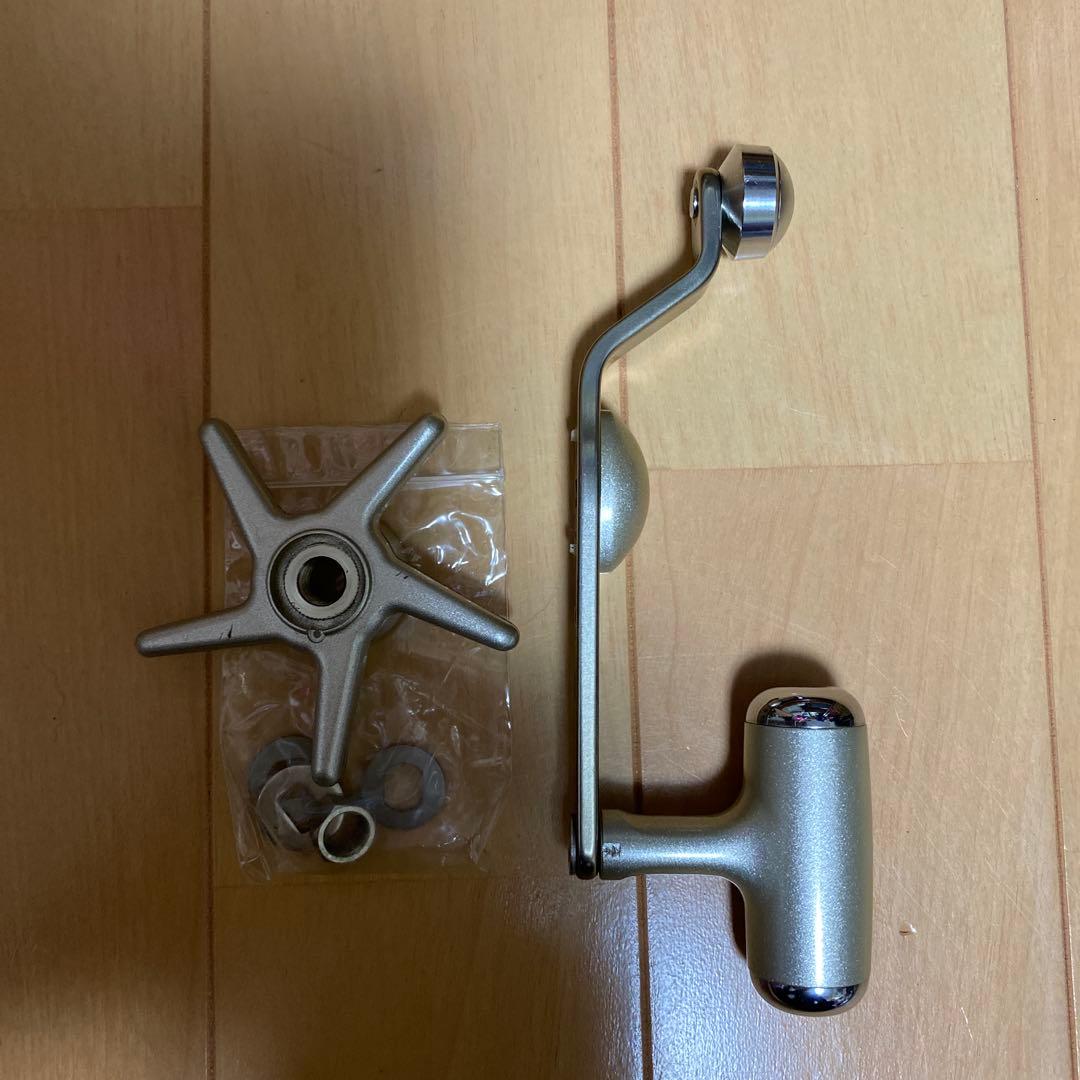 ダイワ石鯛リールと釣武者チタンパワーディスクドラックハンドル付き