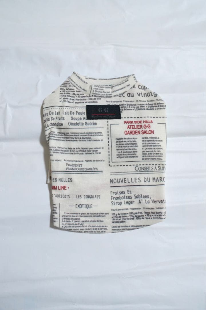 アトリエgg ニュースペーパー柄トップス