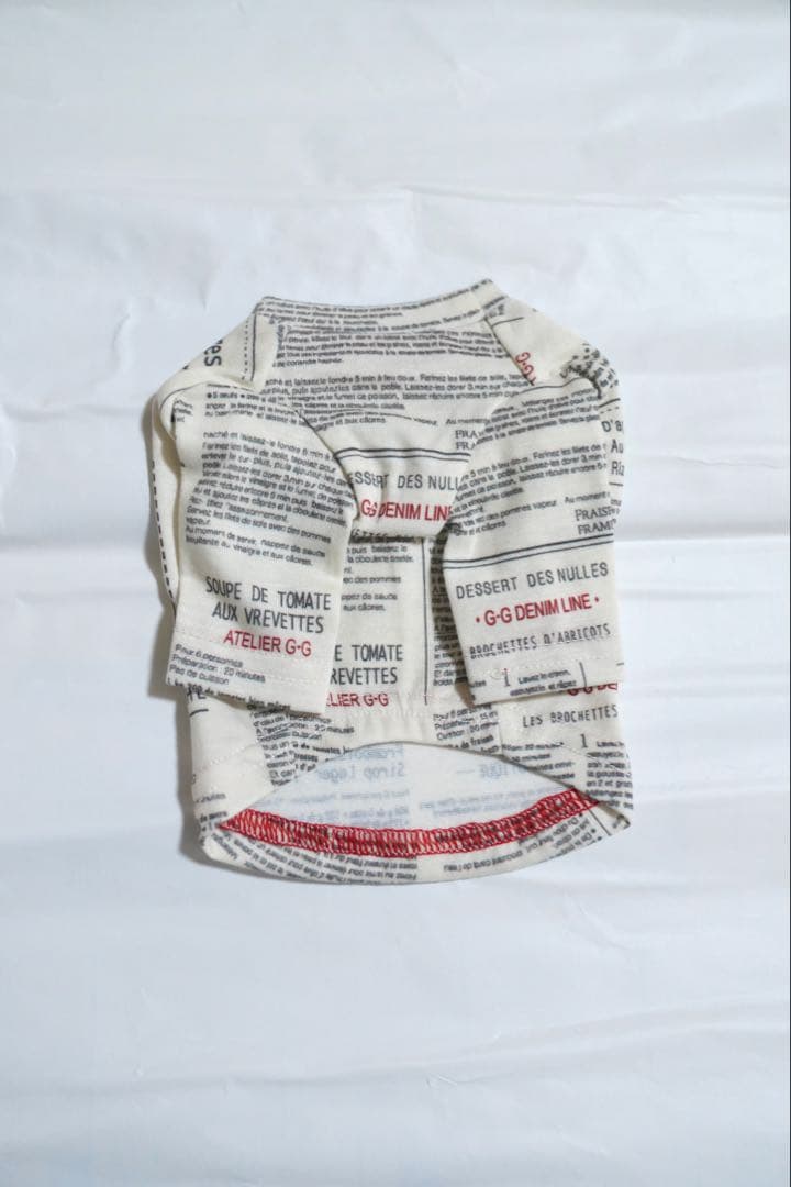 アトリエgg ニュースペーパー柄トップス