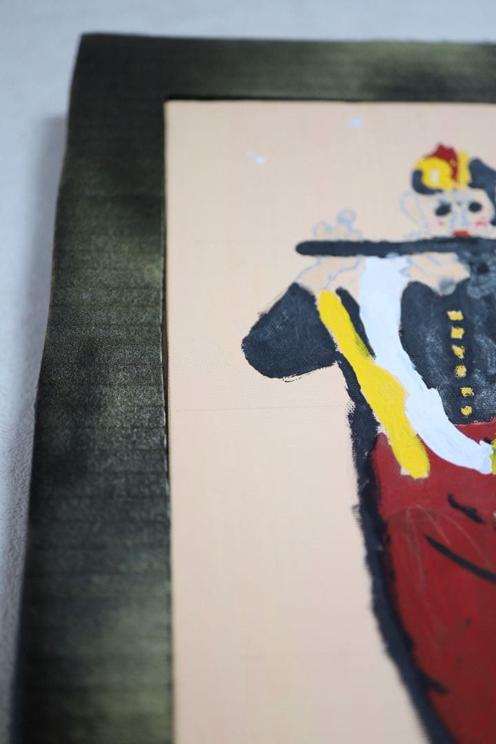 小学生が描いた「笛を吹く少年」