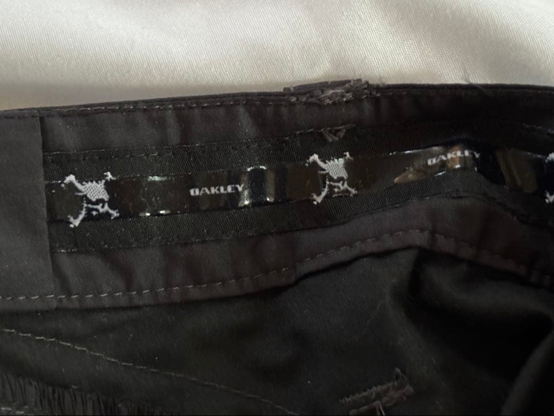 美品✨Oakley オークリー　ゴルフウェア　黒パンツ　スカル刺繍　サイズ33