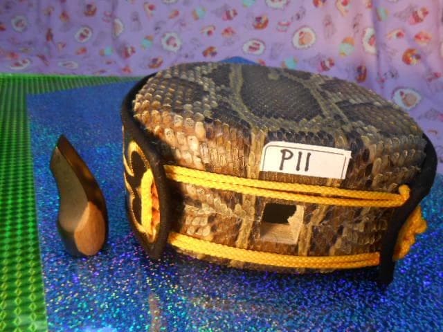 P11現品販売(送料無料)16.980円　沖縄三線専用　蛇皮強化張チーガ、黒檀爪