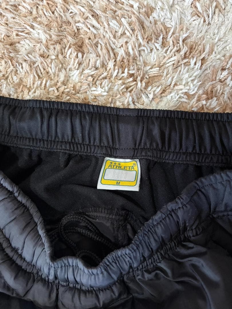 ATHLETA ピステ ウィンドブレーカー セットアップ 上下 中綿 ウォーム