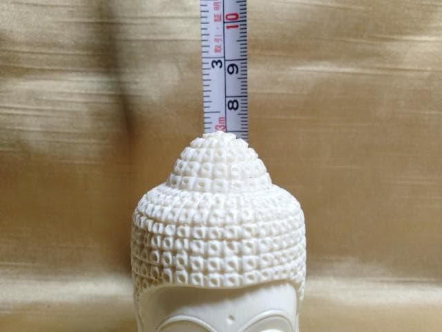 彫刻　仏頭　高さ7cm　まぶたに欠けあり
