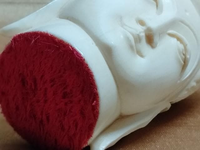 彫刻　仏頭　高さ7cm　まぶたに欠けあり