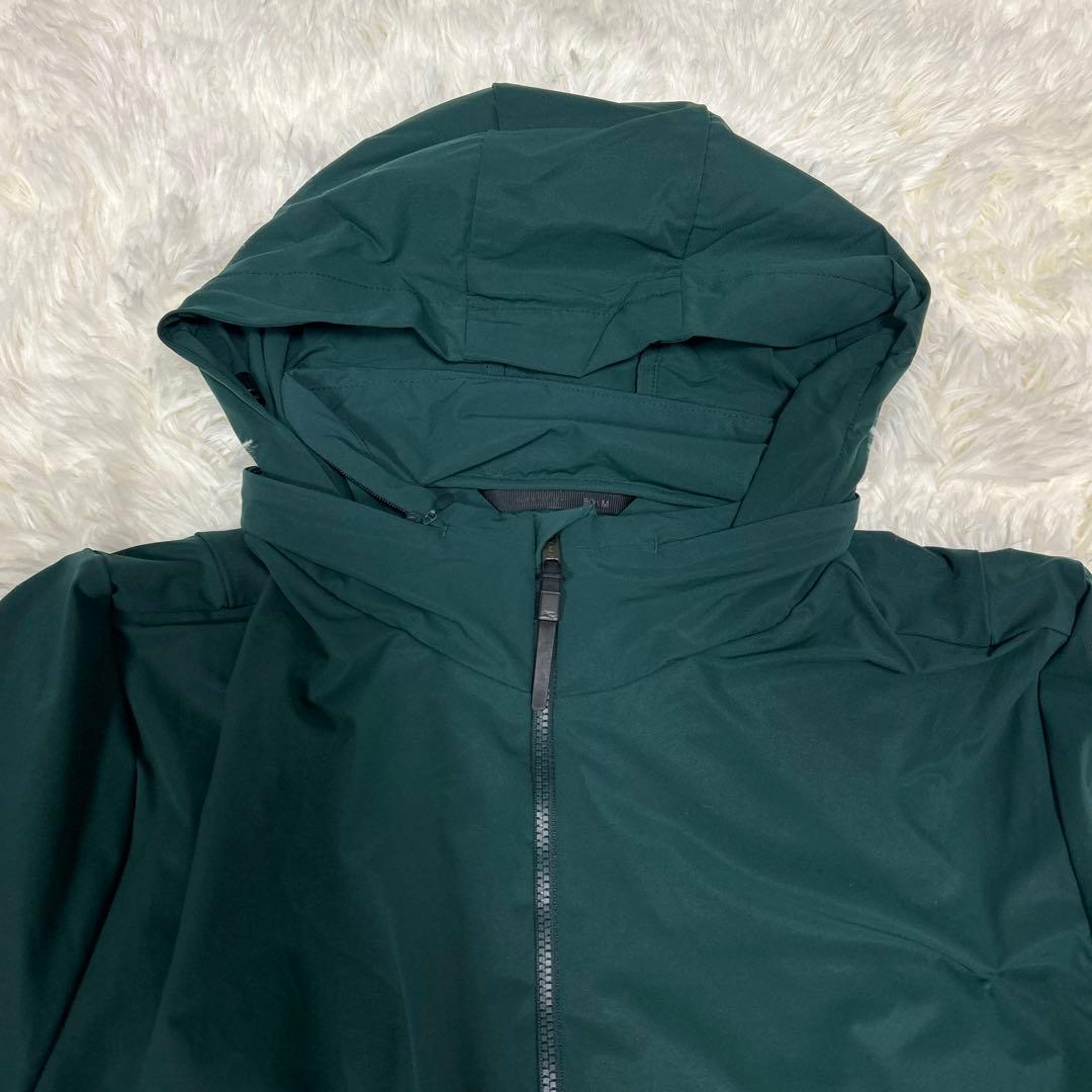 KJUS チュース　ジップアップジャケット　ダークグリーン　フード収納付き　M