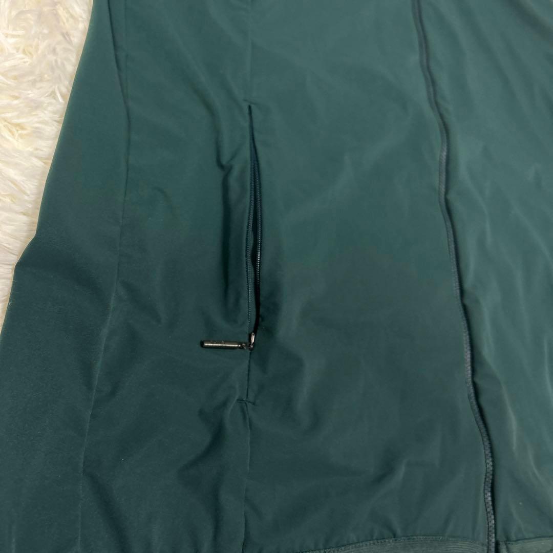 KJUS チュース　ジップアップジャケット　ダークグリーン　フード収納付き　M