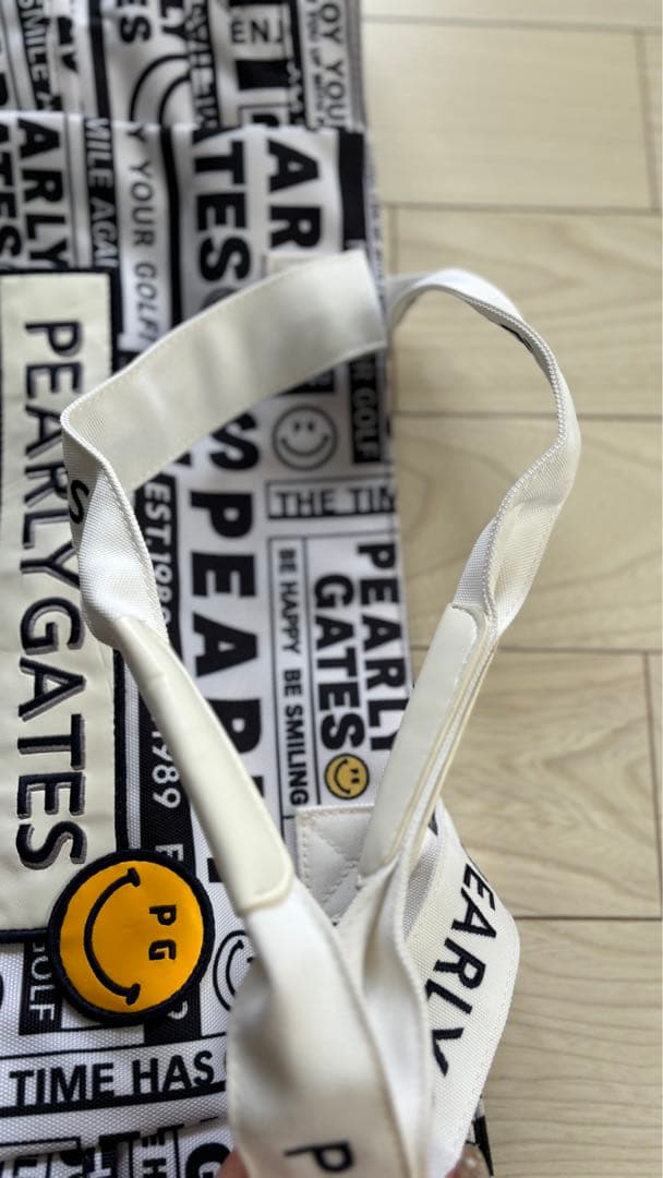 パーリーゲイツ　ロッカーバック　ニュースペーパー柄