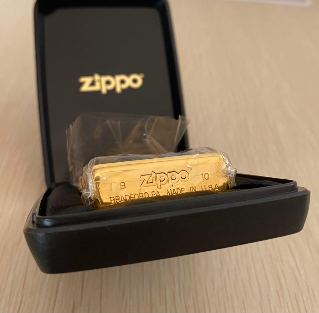 ZIPPO 2010年　ゴールド ブラック 彫刻デザイン 未使用 限定 ケース付
