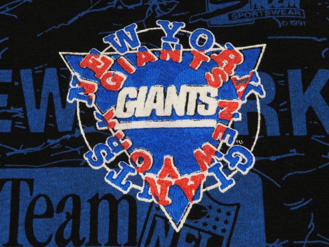 ✅️ USA製 ビンテージ NFL ジャイアンツ Tシャツ 総柄 アメフト L