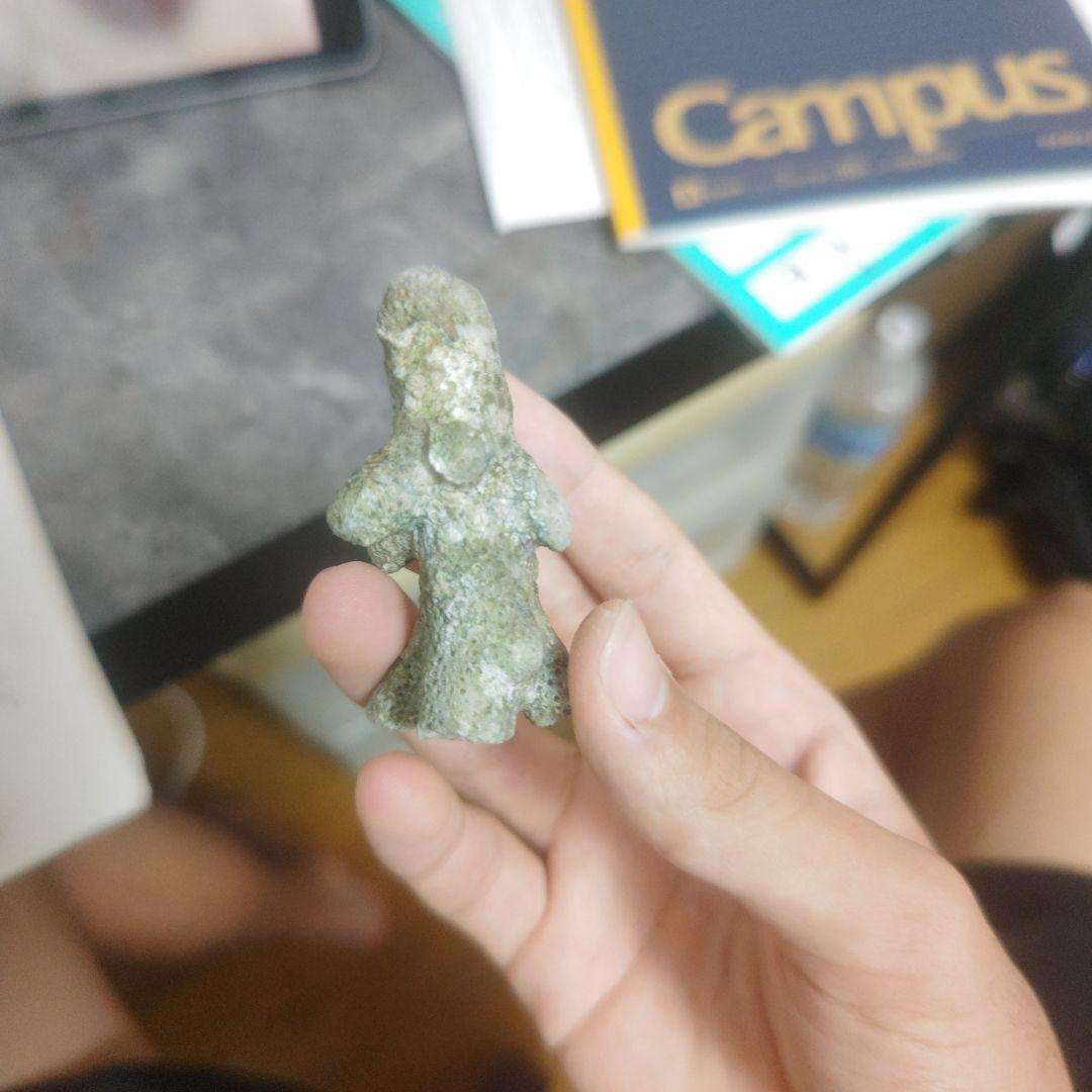 沖縄で拾った人みたいな石