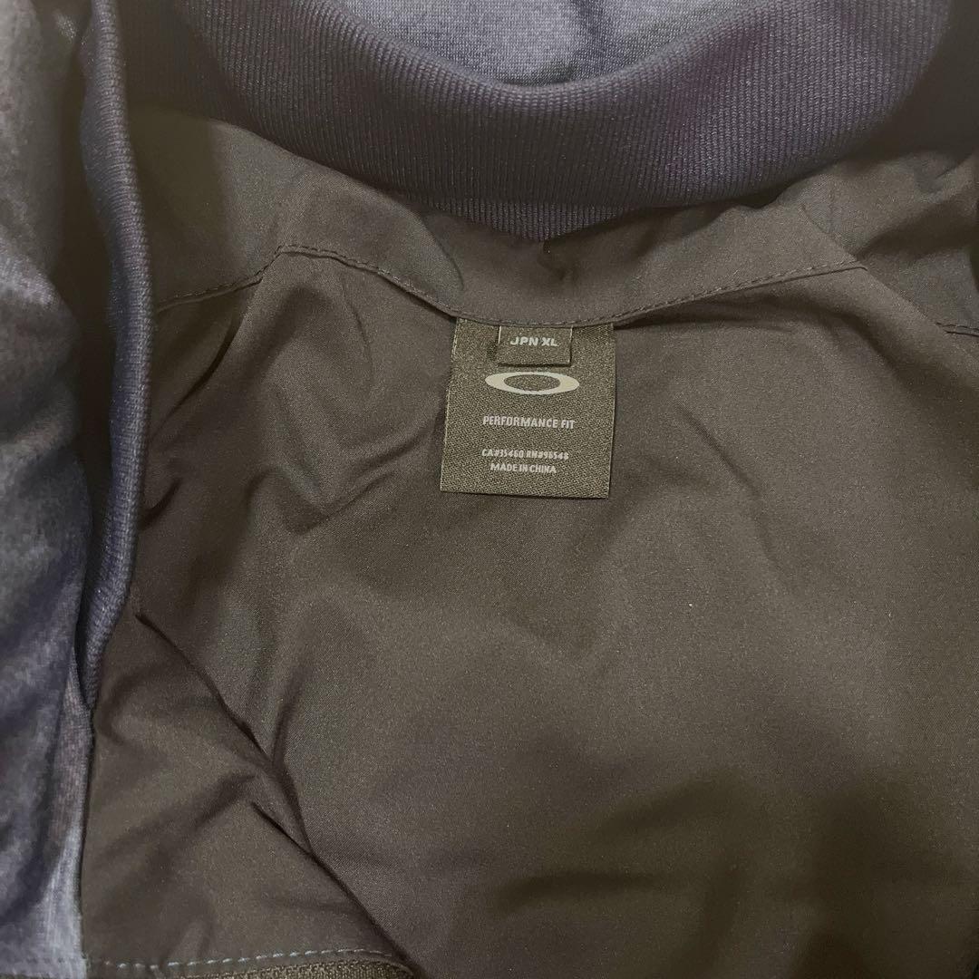 【極美品】OAKLEY　ダウンジャケット　ゴルフ　高機能　ロゴ刺繍　XL相当　紺