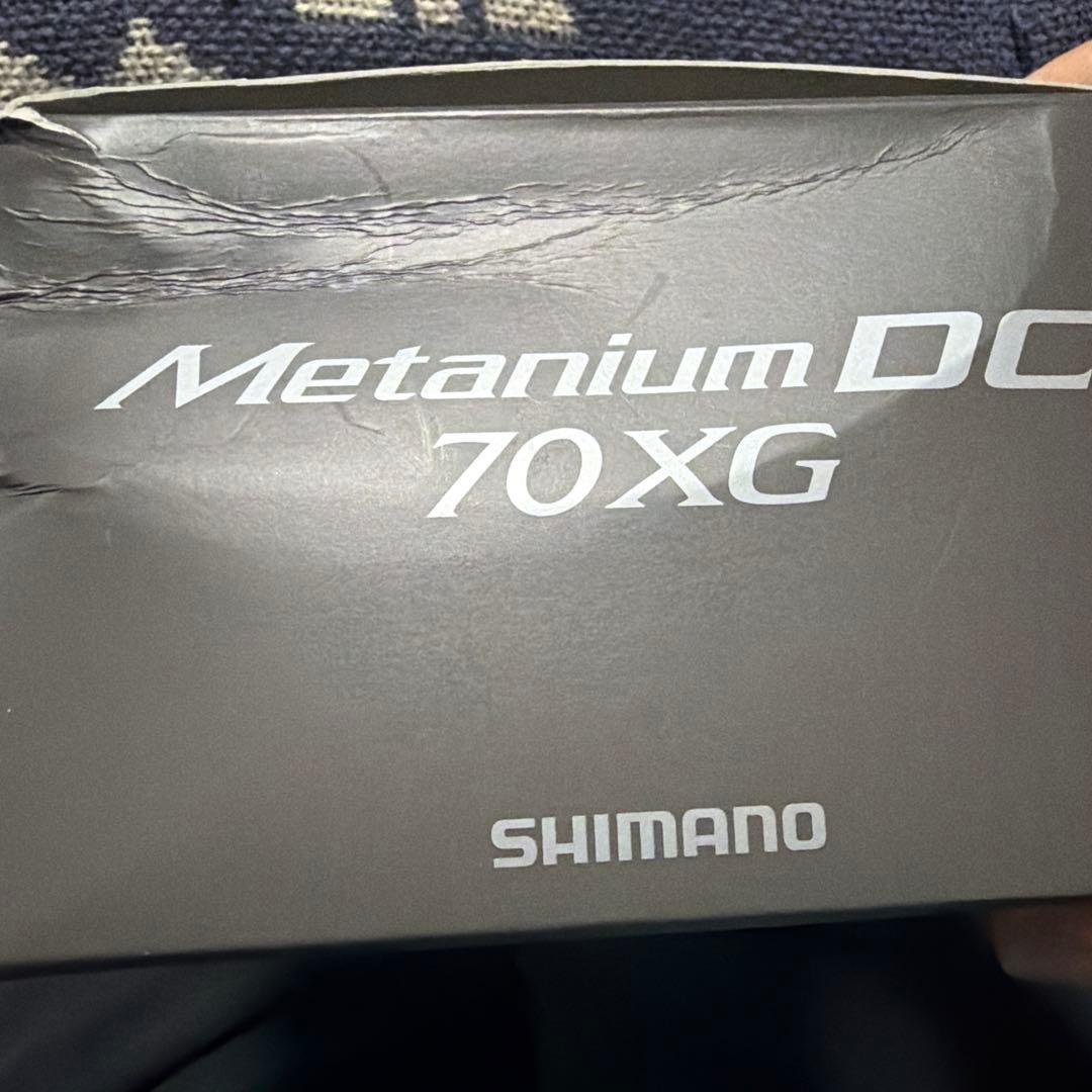 SHIMANO nium DC 70XG メタニウムDC (左)