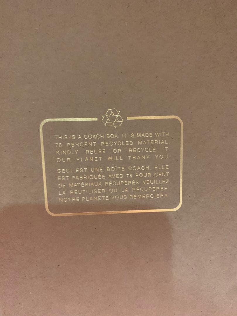 COACH 骨型チャーム付きレザー首輪