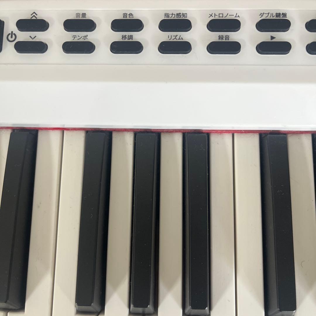 ホワイト電子ピアノ 多機能付き　88鍵盤