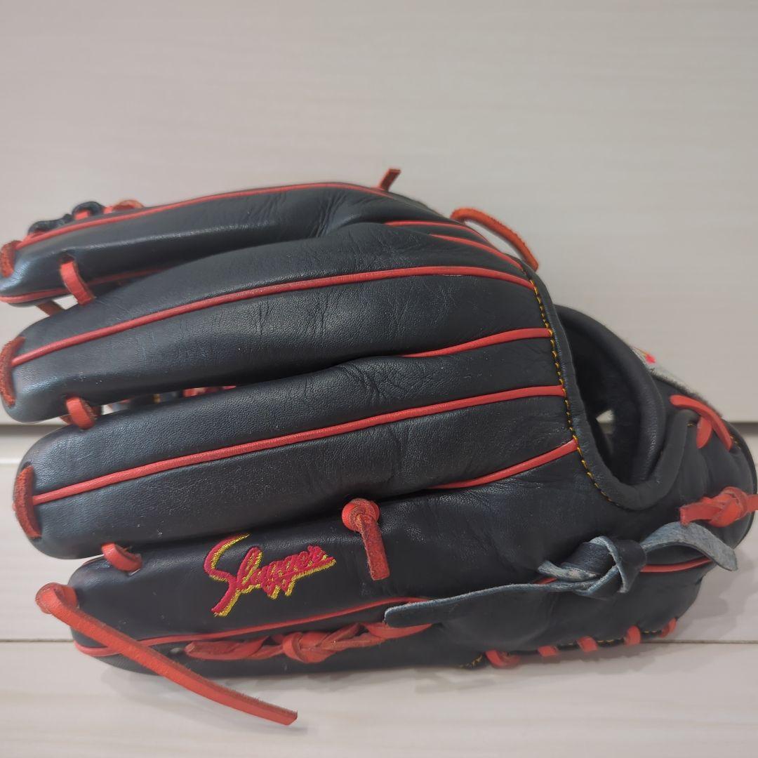 久保田Slage 軟式グローブ 黒/オレンジ